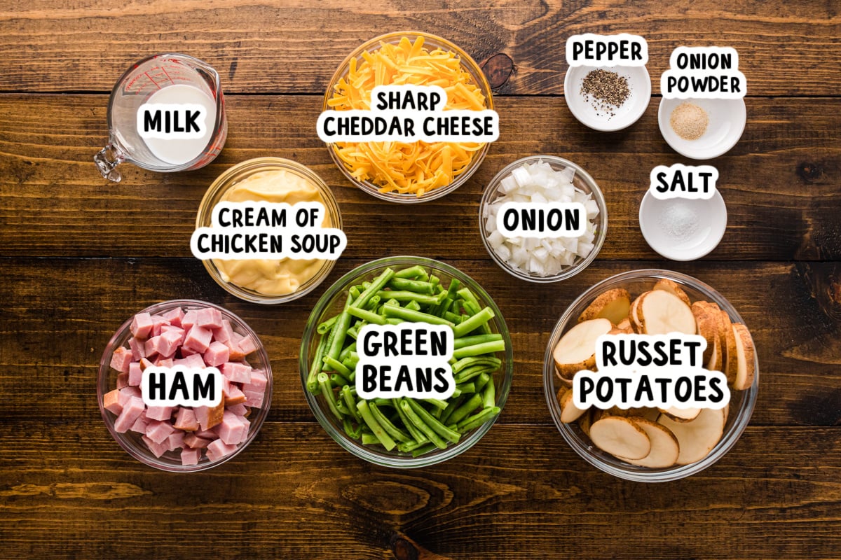 Ingredients for making a vintage ham and potato dinner on a table.