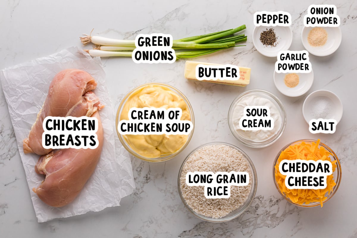 Ingredients for crockpot chicken and rice on a table.