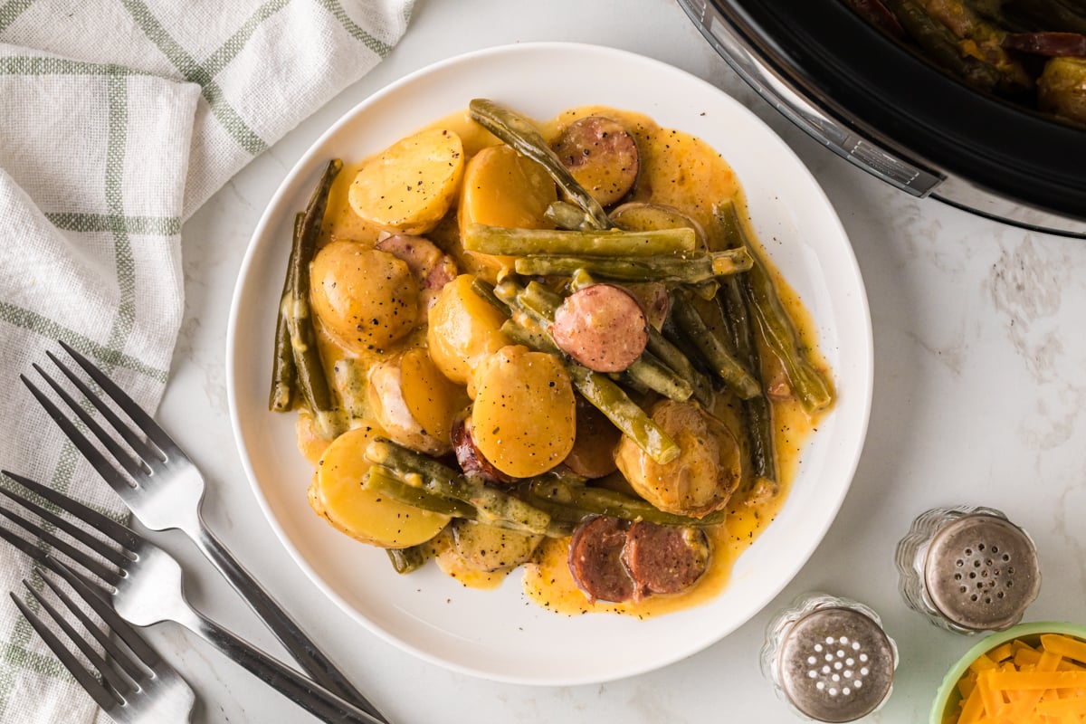 A serving of swamp potatoes on a white plate.