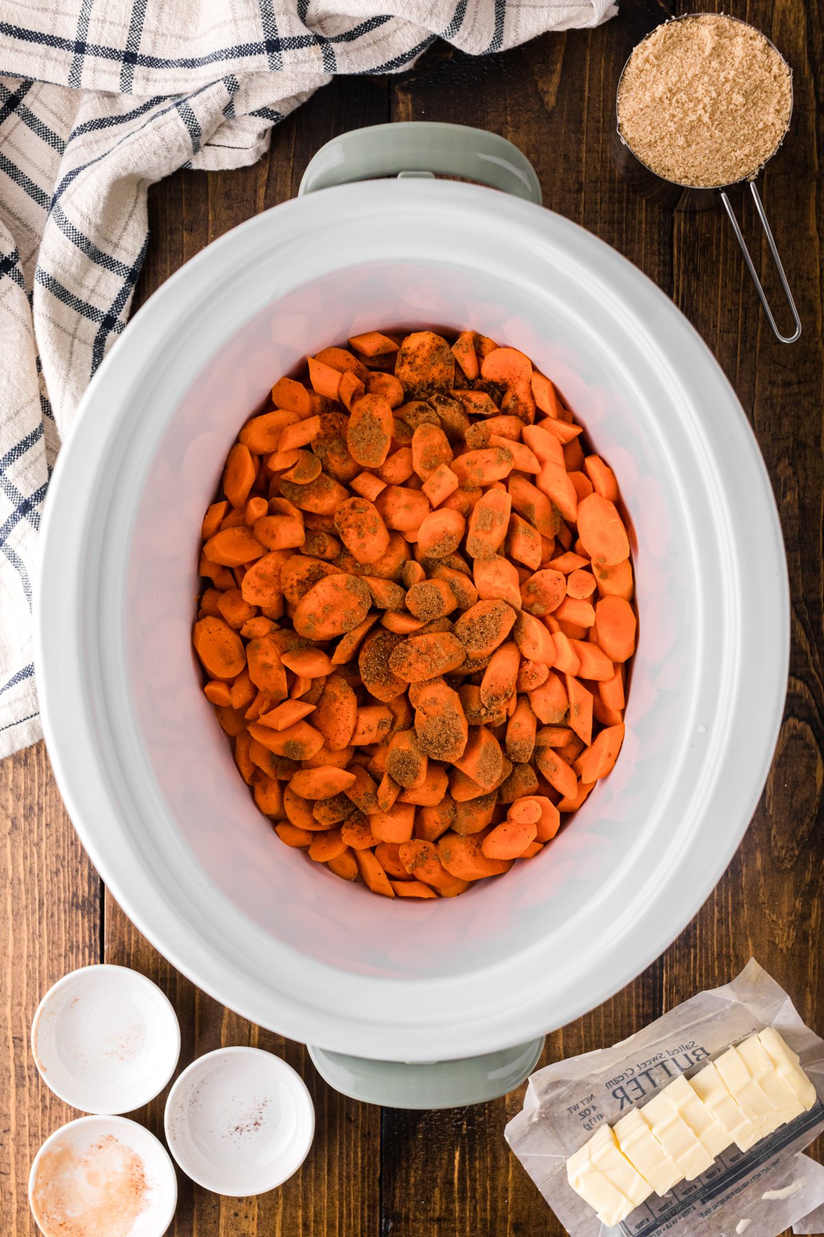 Carrots and spices in a crockpot.