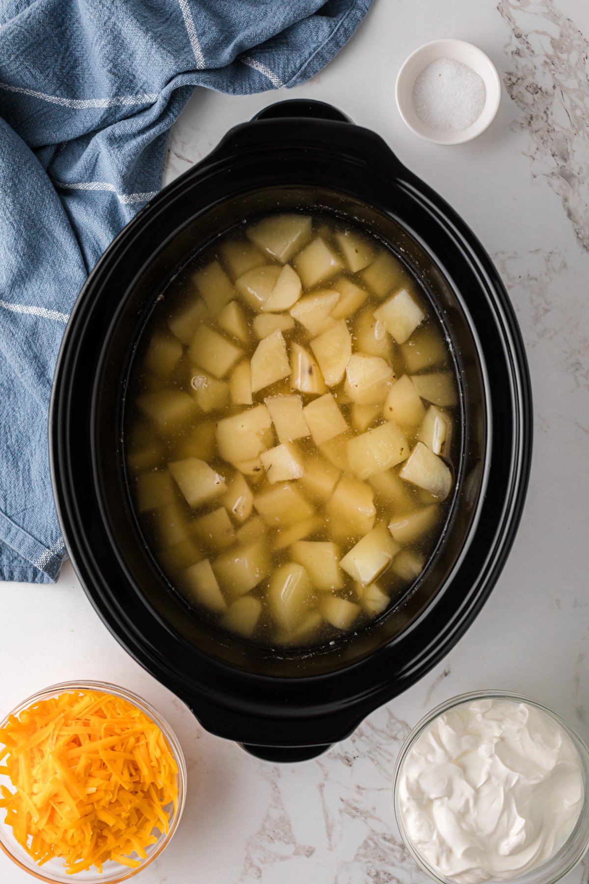 Potatoes in a crockpot after cooking.