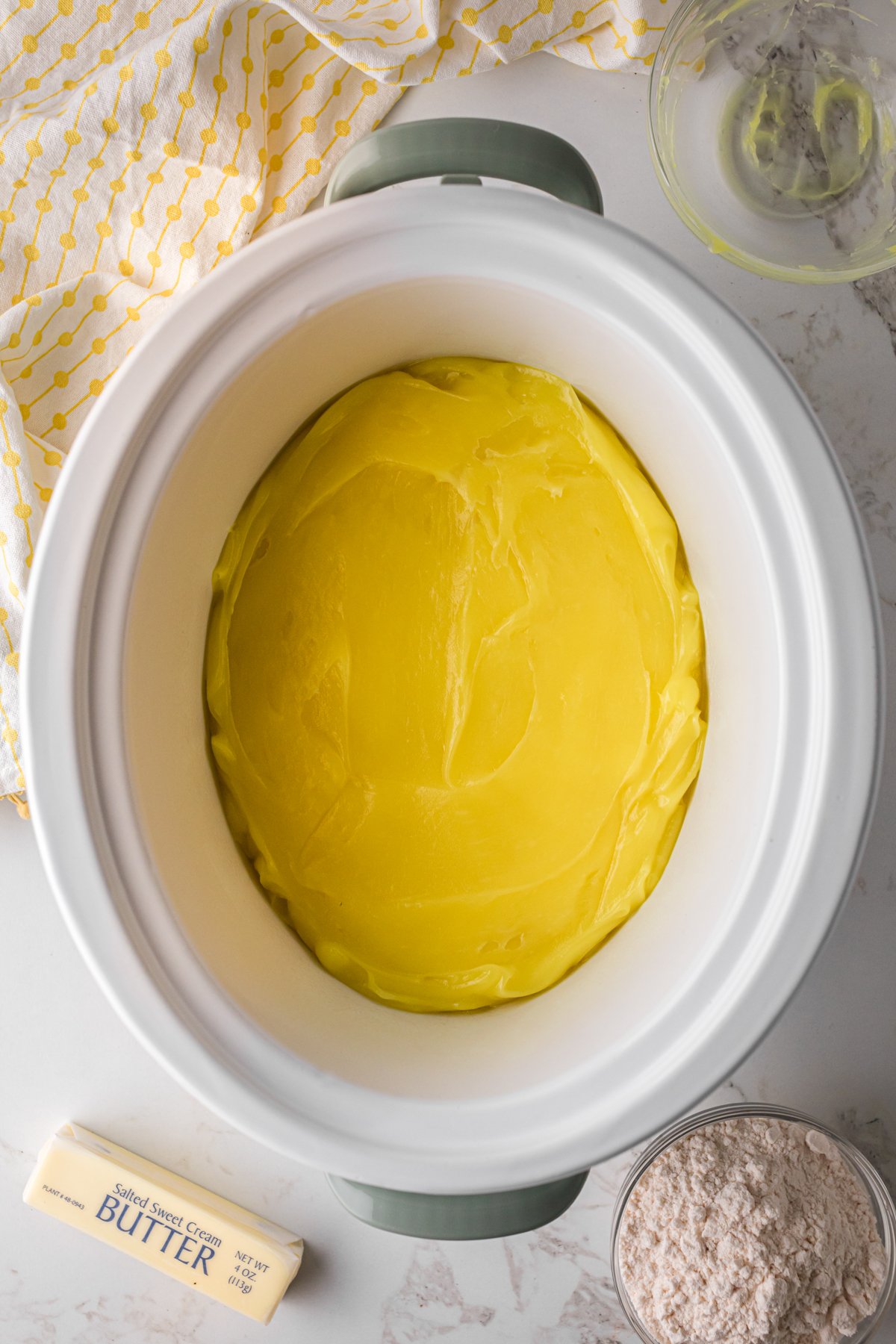Lemon pie filling in a crockpot.