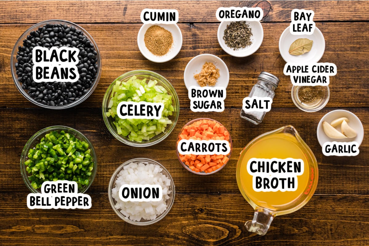 Ingredients for Cuban black beans on a table.