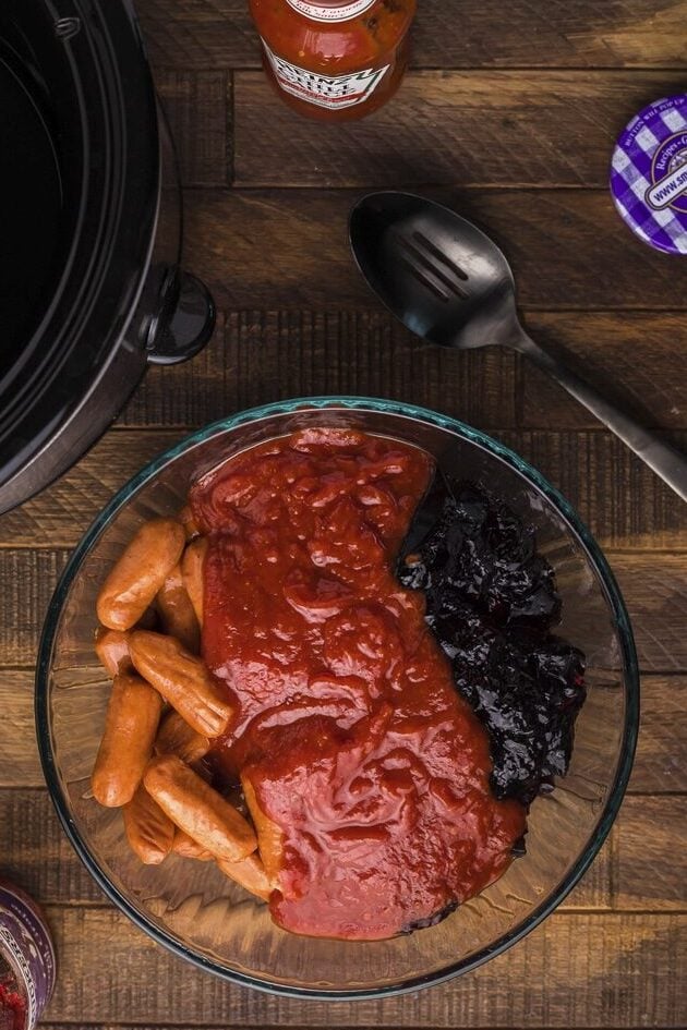 little smokies, grape jelly and chili sauce in bowl.