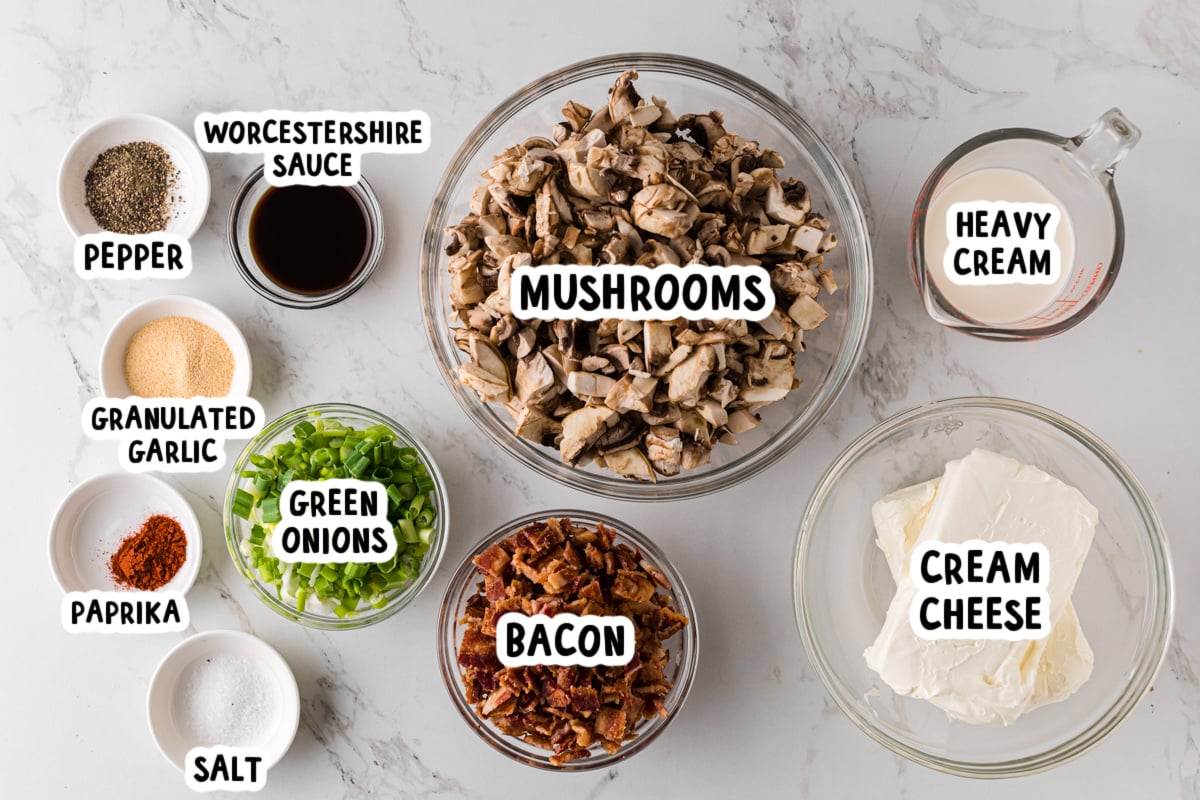 Ingredients for stuffed mushroom dip on a table.