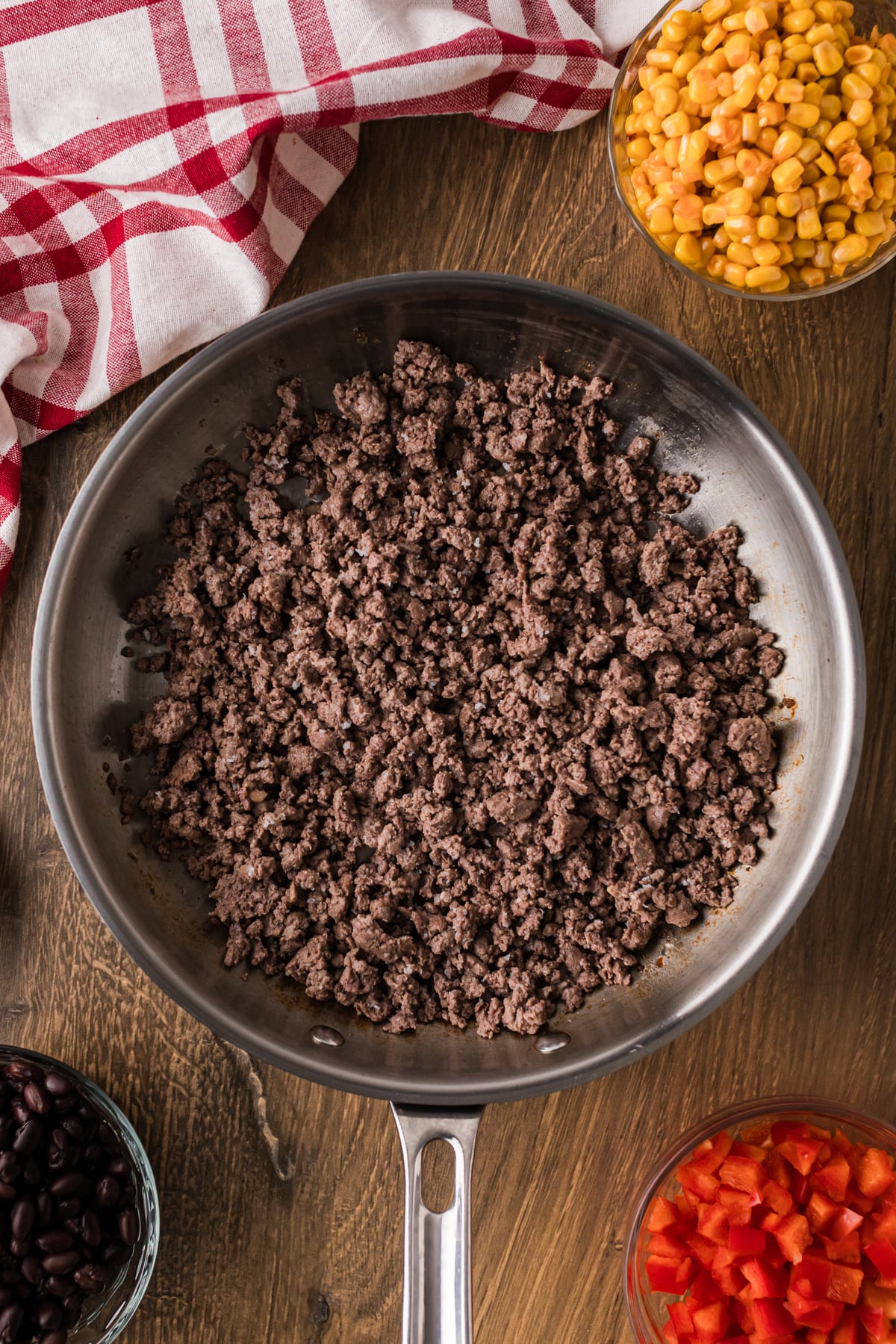 Crumbled ground beef in a skillet after browning.