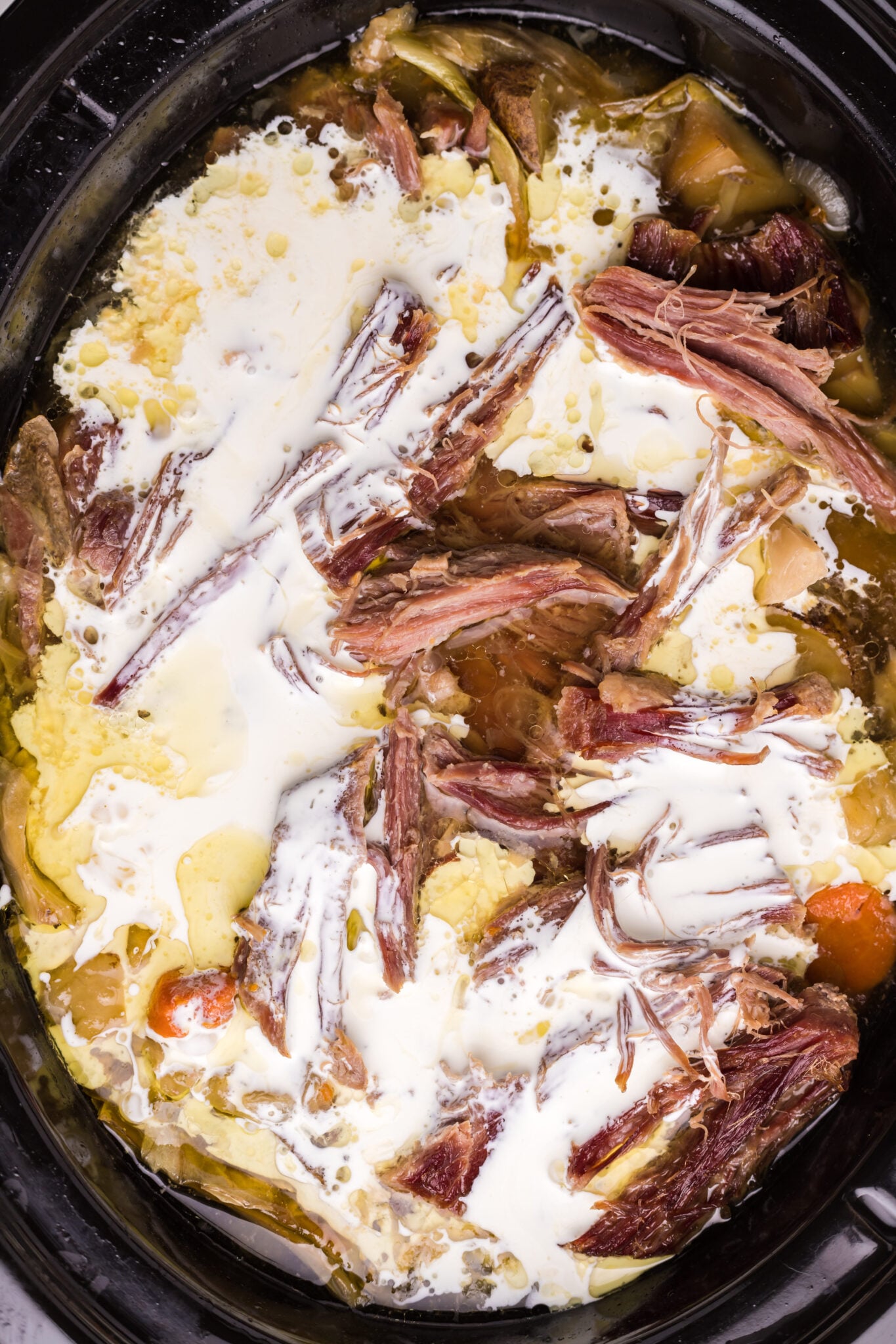 Done cooking soup after the meat is shredded and cream added.