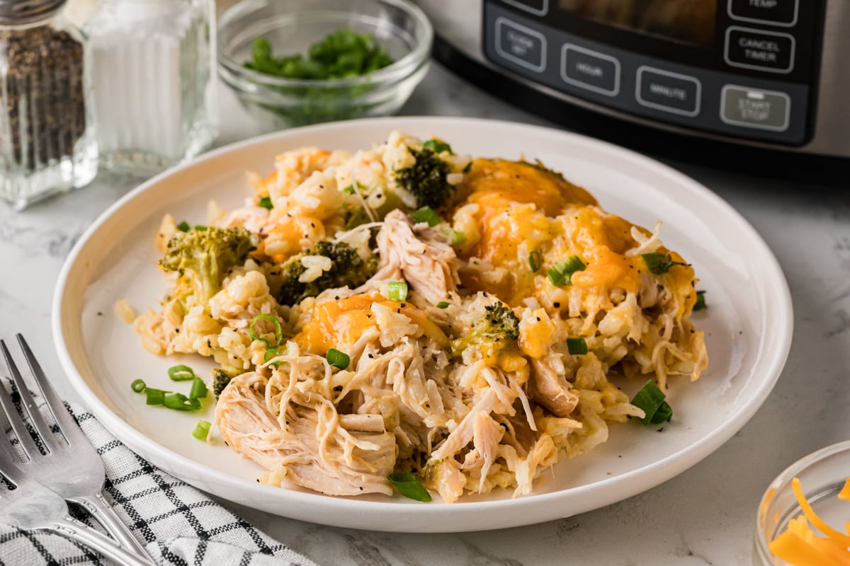 A plate with a serving of chicken broccoli and rice casserole.