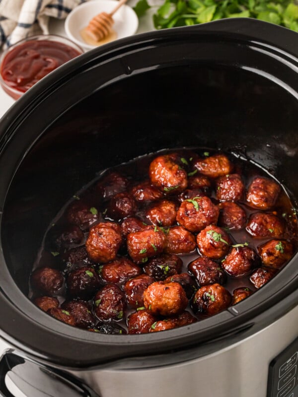 A crockpot filled with honey chipotle meatballs.