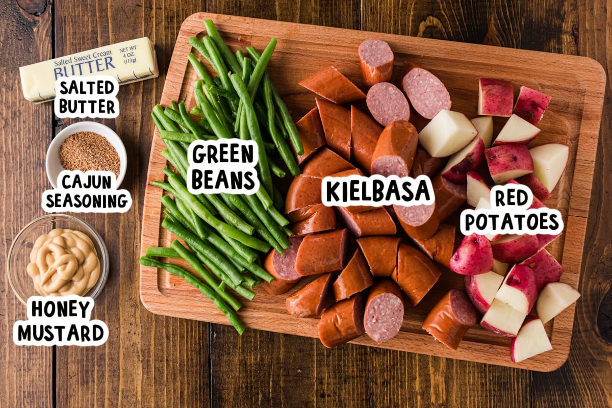Ingredients for kielbasa dinner on a table.