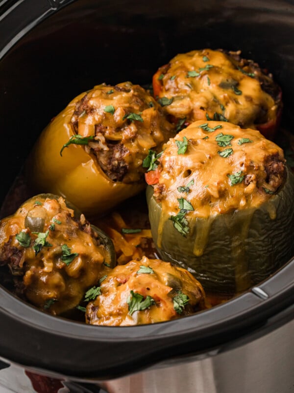 Taco stuffed peppers in a crockpot after cooking.