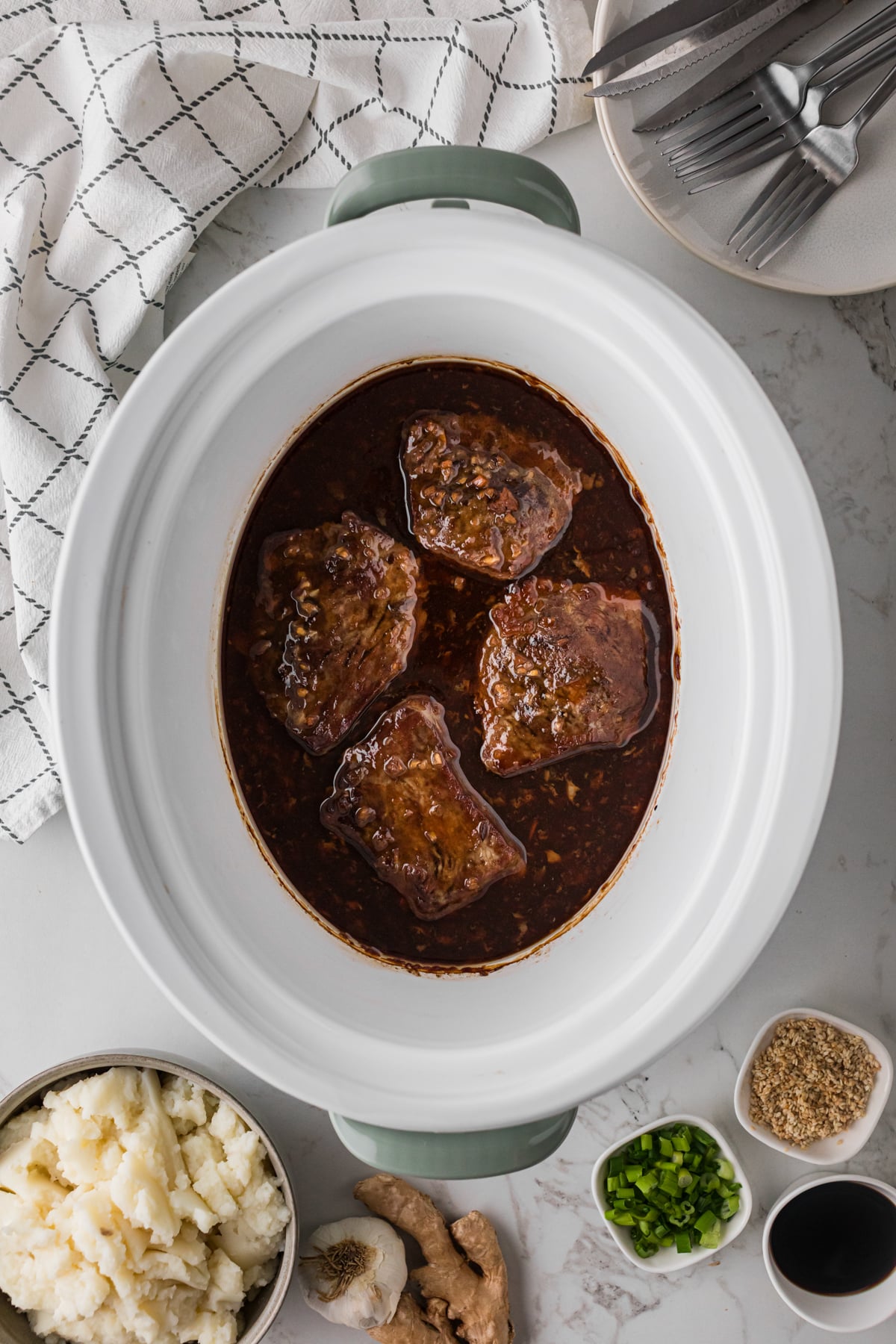 Teriyaki steaks after cooking in a crockpot.