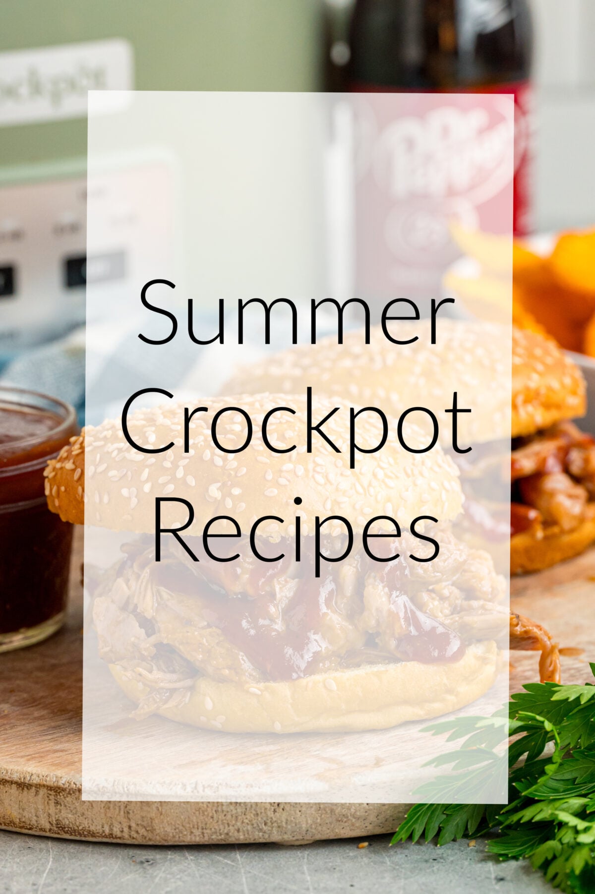 A pulled pork sandwich with an overlay that says, "summer crockpot recipes".