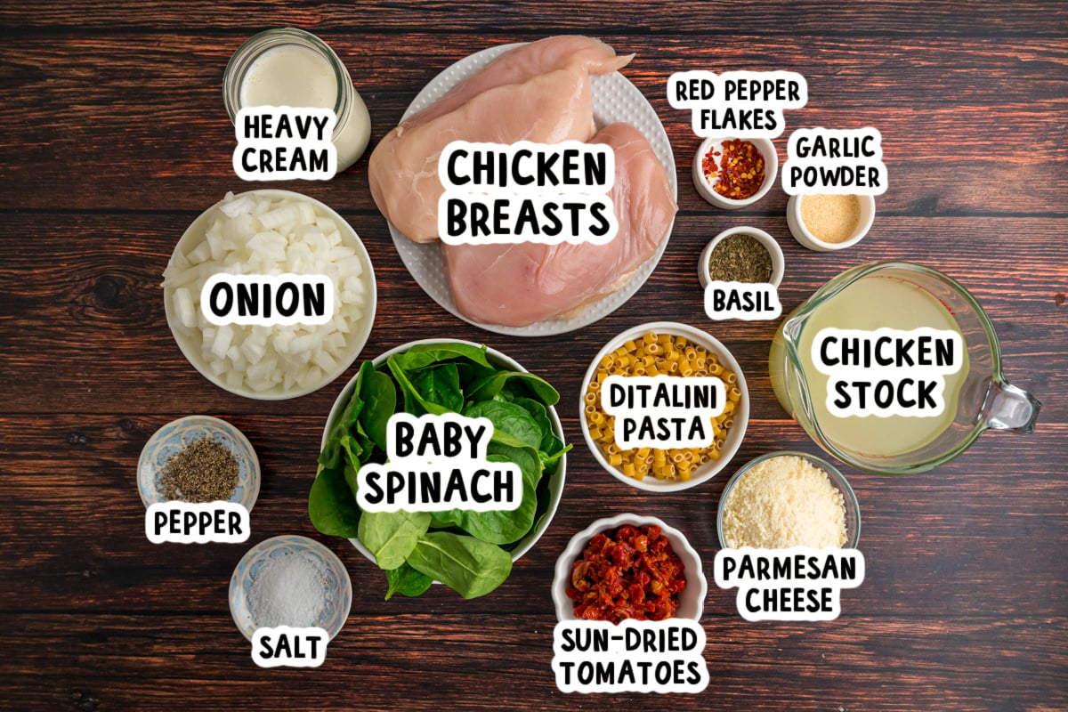 Ingredients for marry me chicken soup on a table.