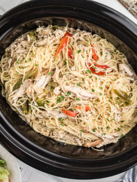 Olive garden copycat chicken scampi in a crockpot after cooking.